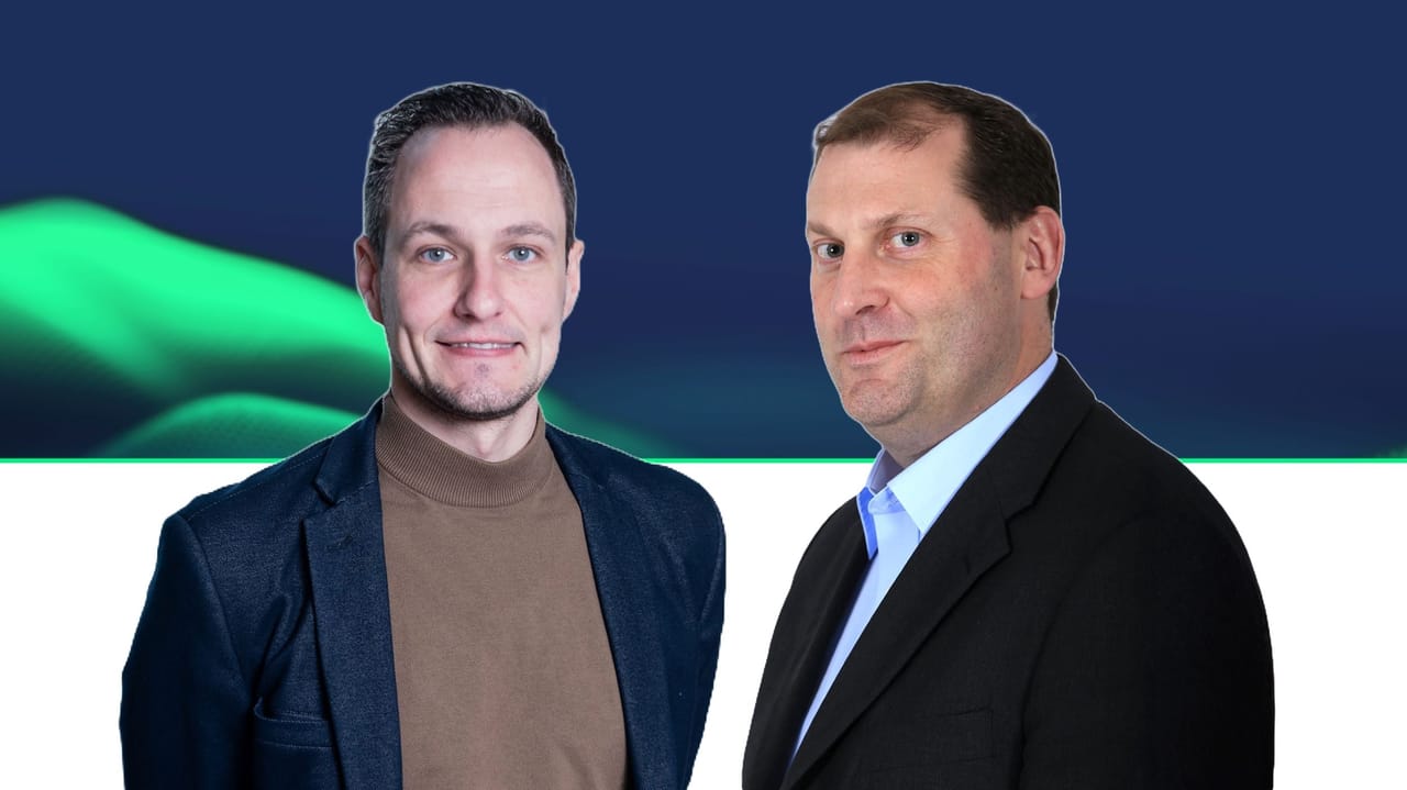 Two professionals in business attire against a dark blue background with green accent lighting.