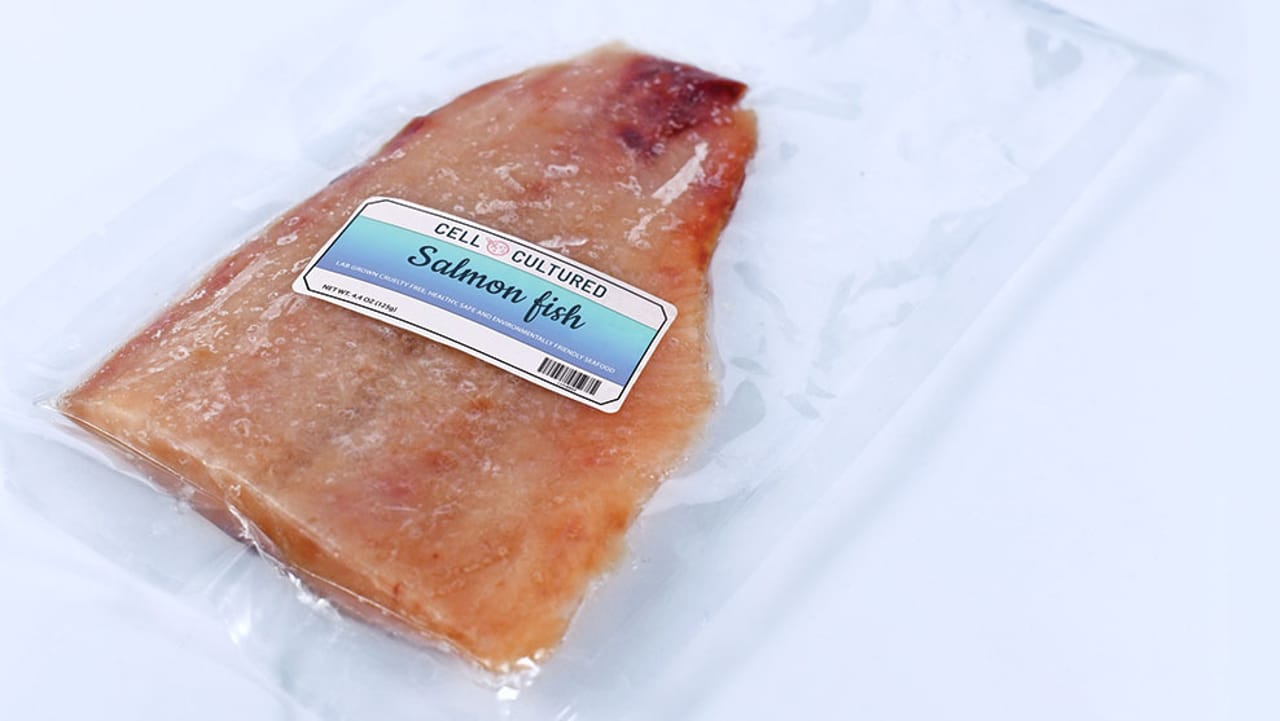 Vacuum-sealed package of cell-cultured salmon fish, 4.4 oz, labeled "Cell Cultured" with cruelty-free seafood claims.