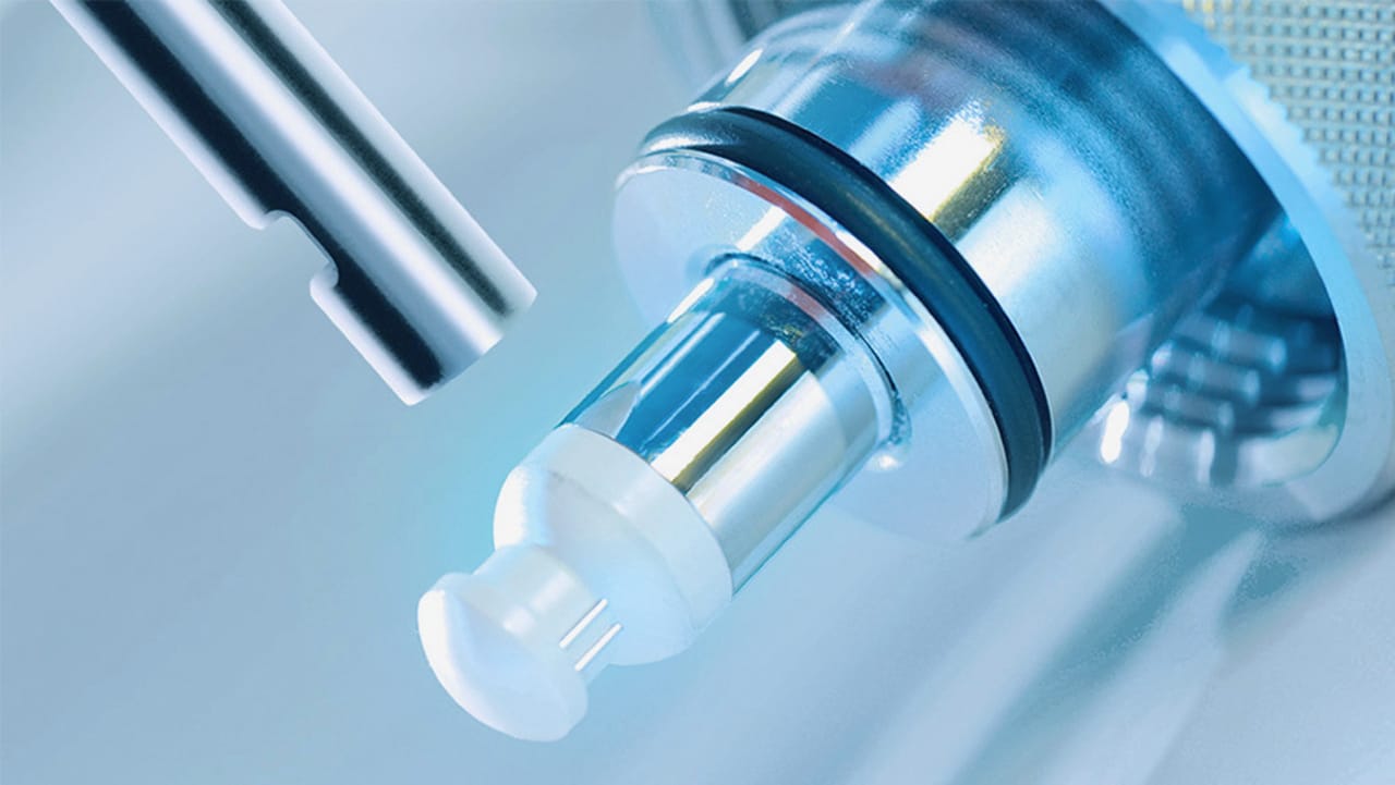 Close-up of a process analytics sensor probe assembly with O-rings and optical element