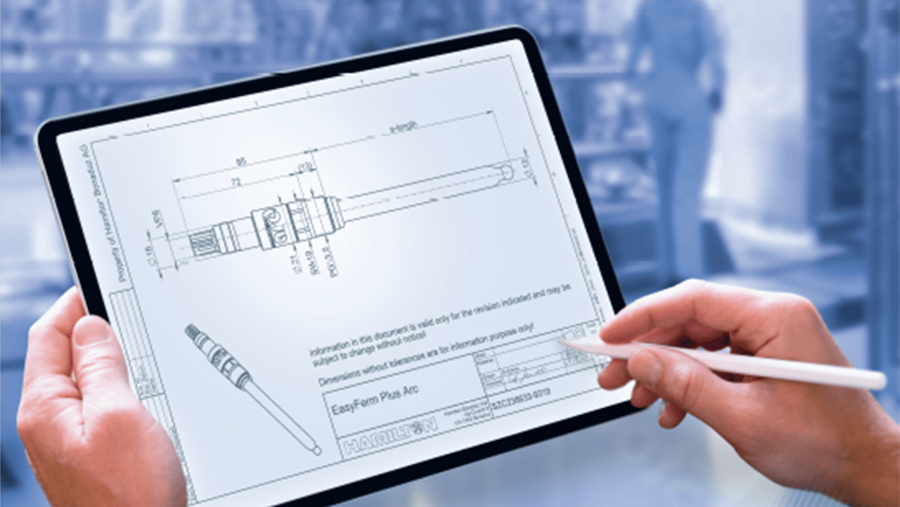 Hands holding a tablet displaying a Hamilton EasyForm Plus Arc technical drawing with a stylus