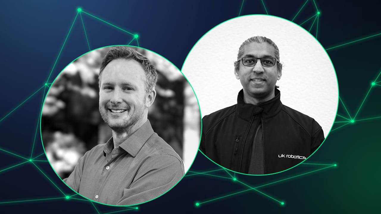 Two circular black-and-white headshots on a dark teal network graphic background; right person wears a UK Robotics jacket.