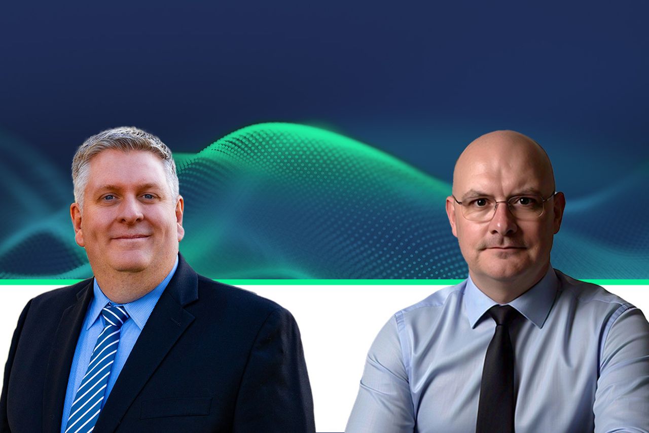 Two professionals in business attire against a dark blue background with green wave graphics.