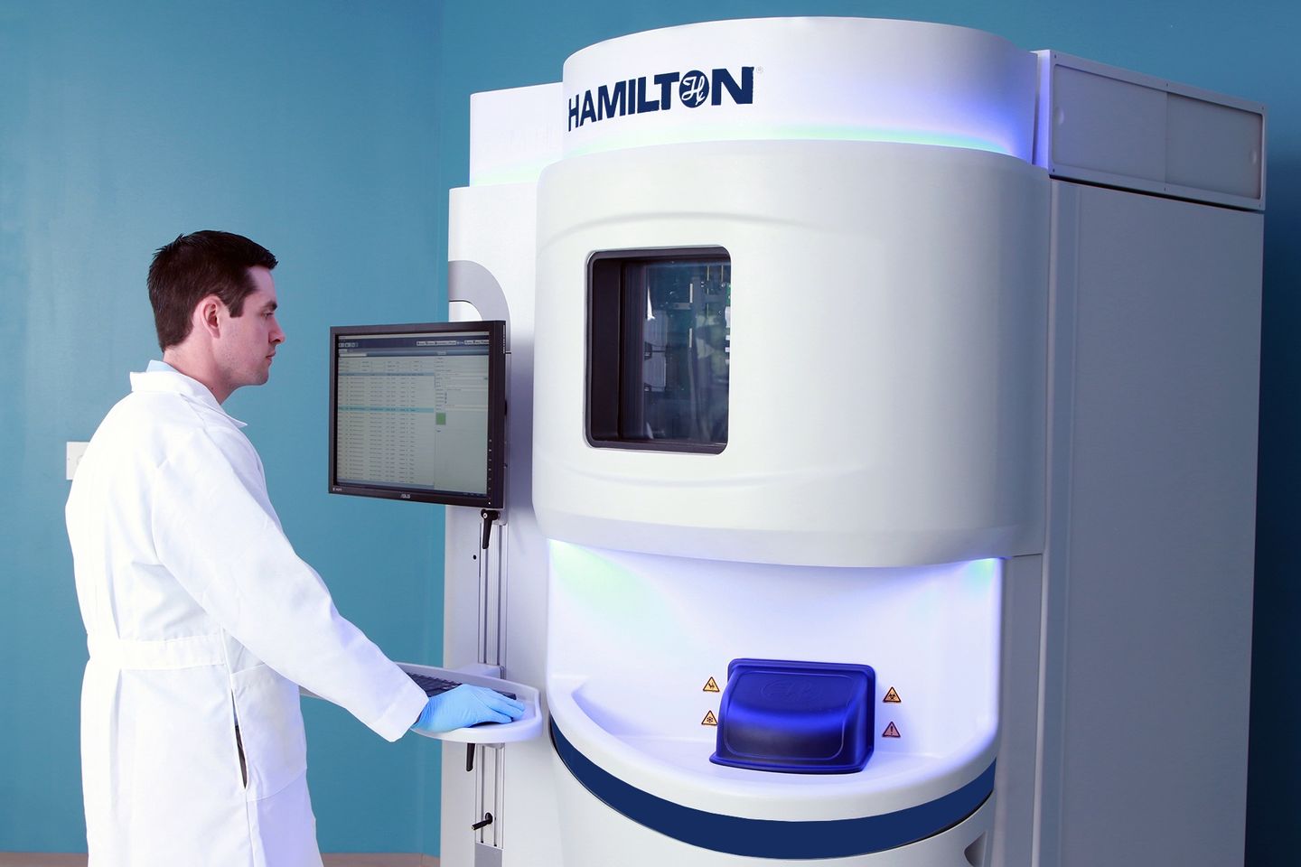 Lab tech working on SAM HD Pro