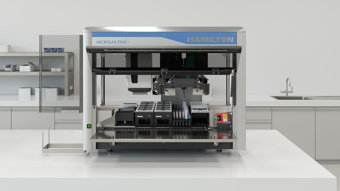 Hamilton Microlab STAR LET automated liquid handling workstation with open deck, pipetting arms, and sample carriers