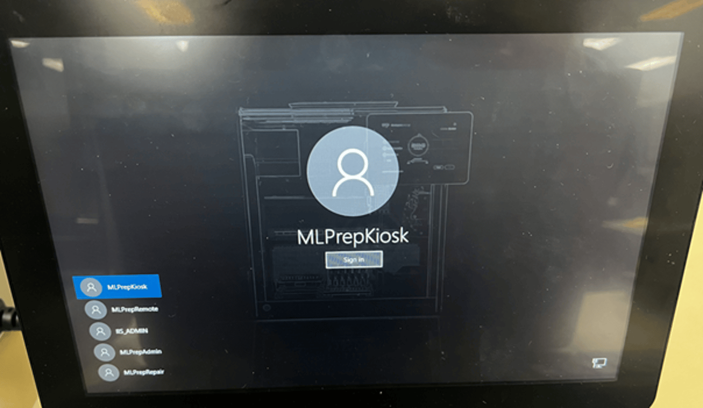 Windows login screen showing MLPrepKiosk account selected, with additional user accounts listed on the left panel.