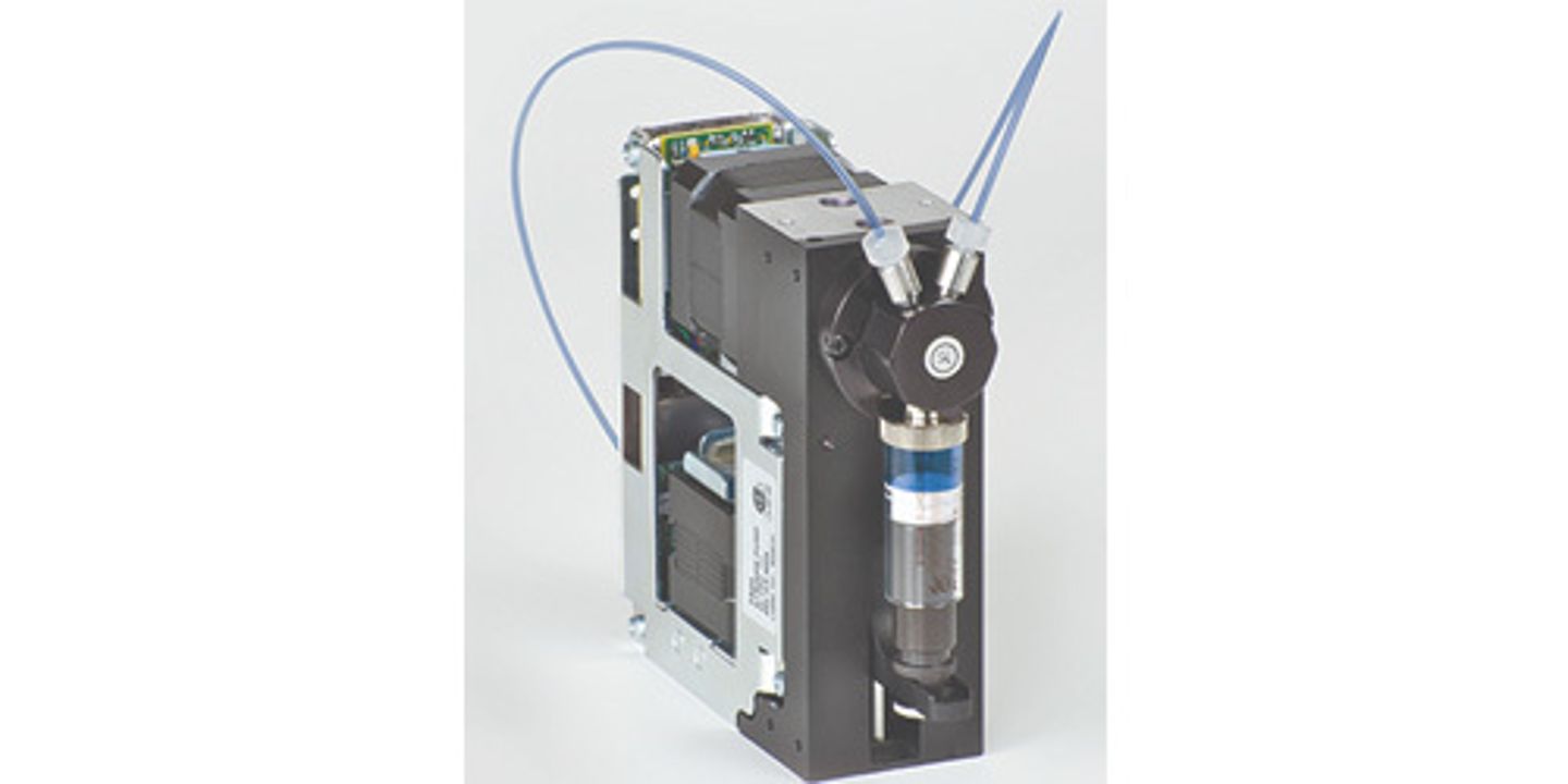 Modular OEM liquid handling assembly with syringe, tubing, and electronics mounted on a compact frame