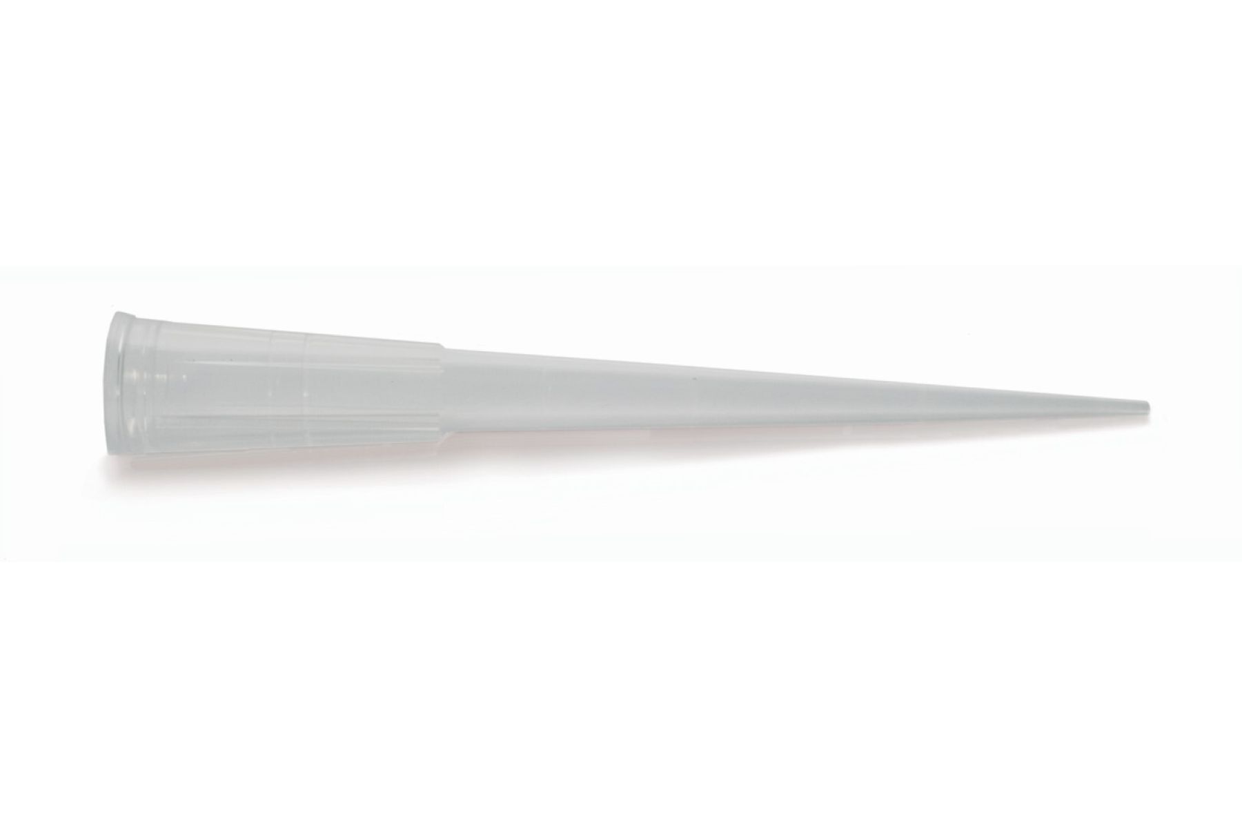 Clear plastic pipette tip with wide opening at left, tapering to fine point at right