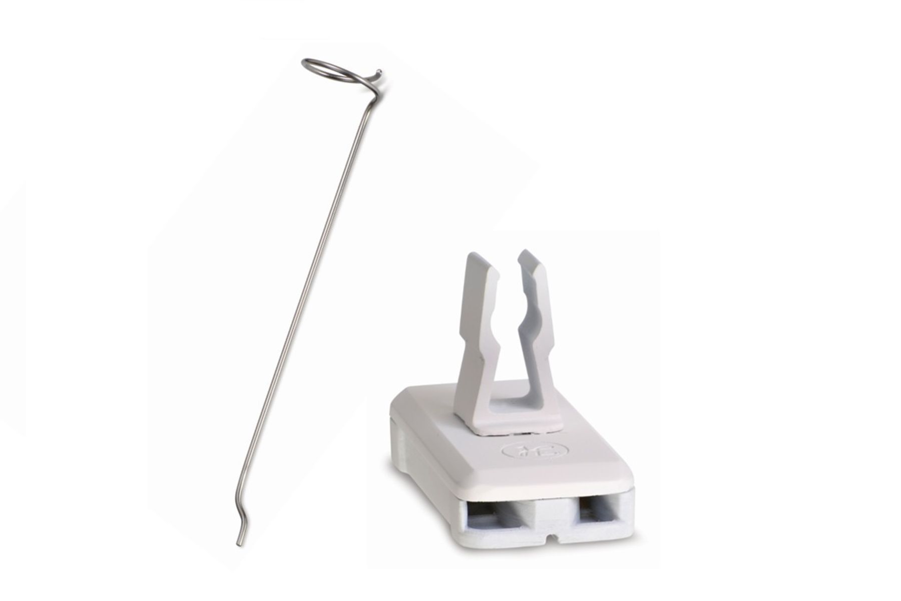 Stainless steel needle guide wire and white plastic needle guide block for syringe assembly