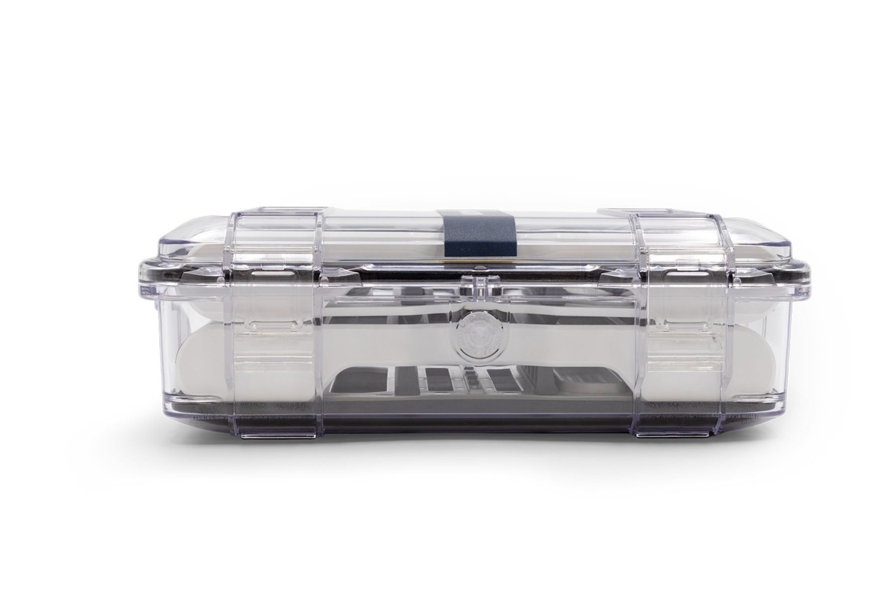 Clear protective case with latching lid containing syringe guard components, viewed from the side