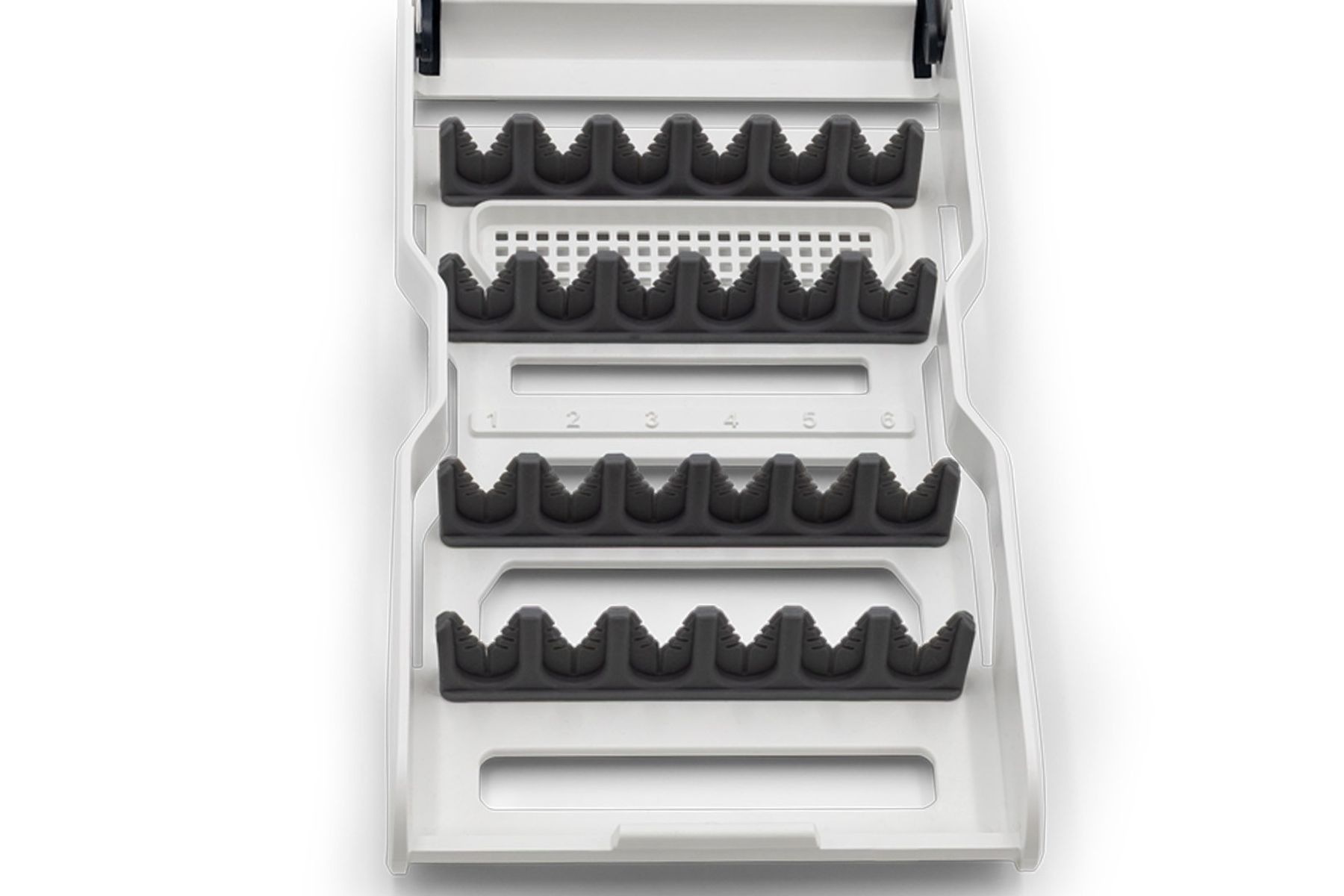 White syringe storage tray with four rows of dark gray rubber needle guards and numbered slots