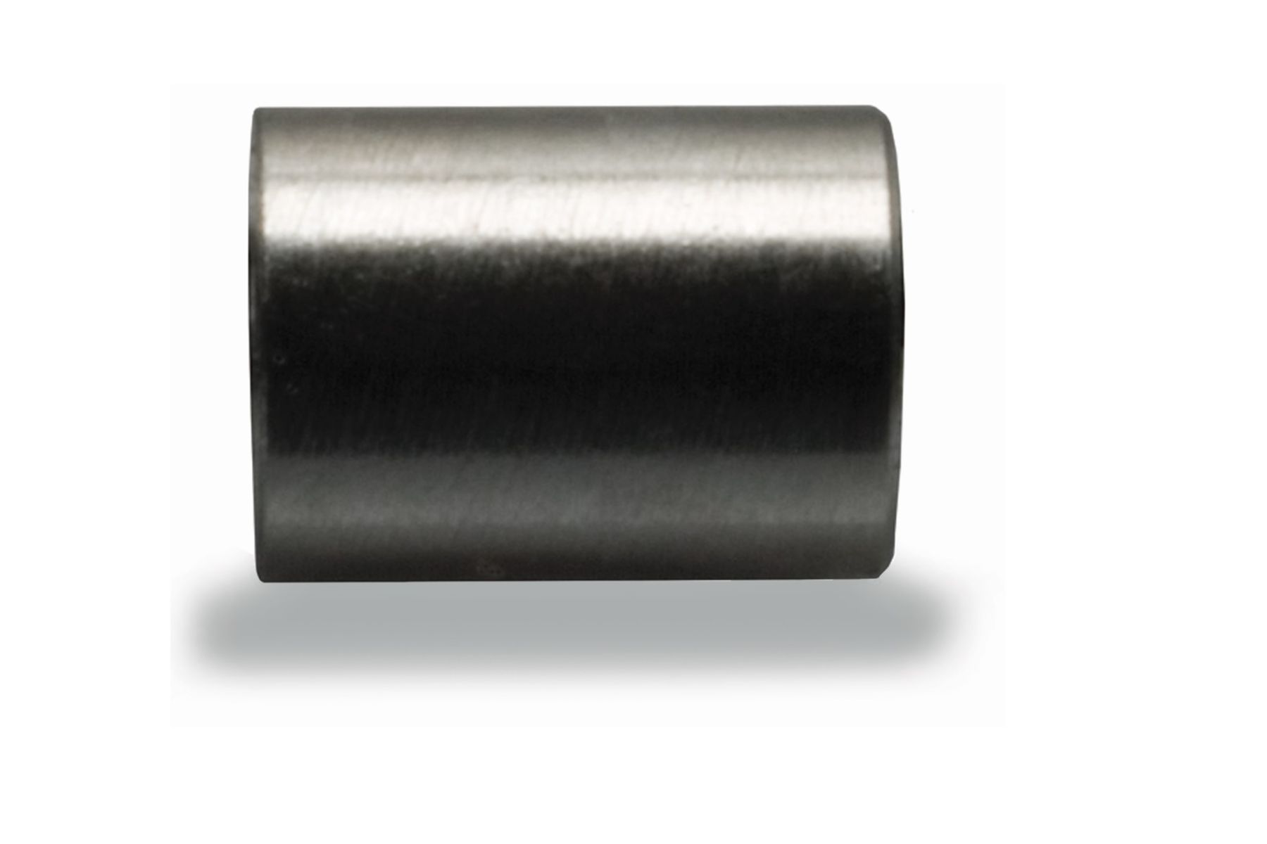 Small cylindrical metal spacer with a smooth brushed finish