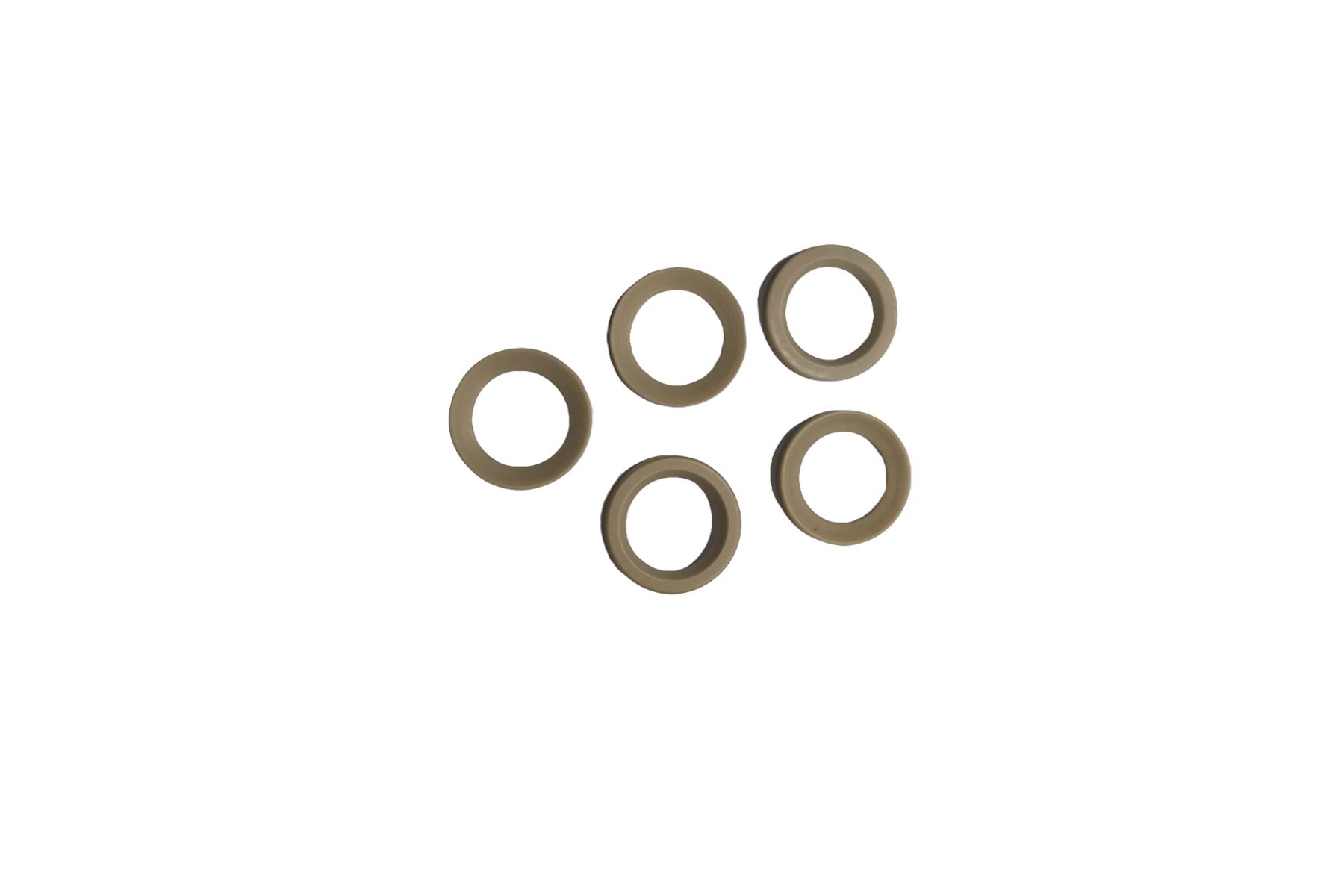Five beige/tan rubber washers arranged in a loose cluster on a white background