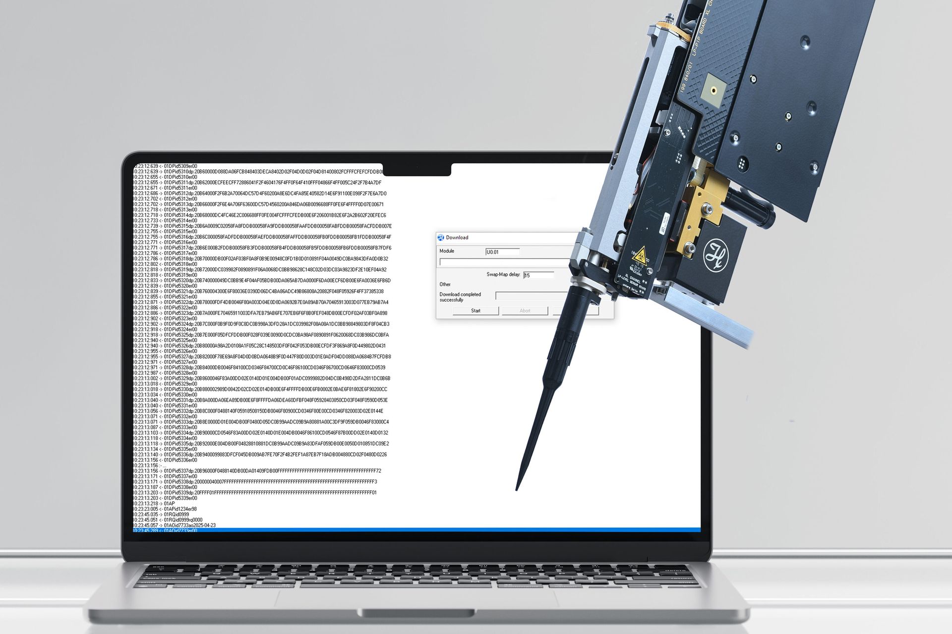 Laptop displaying firmware download log and dialog, with a robotic arm module and screwdriver in the background
