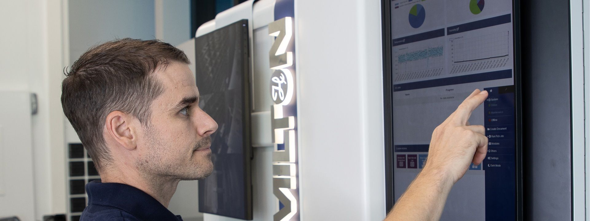 Lab technician interacting with INSTINCT S automation software.