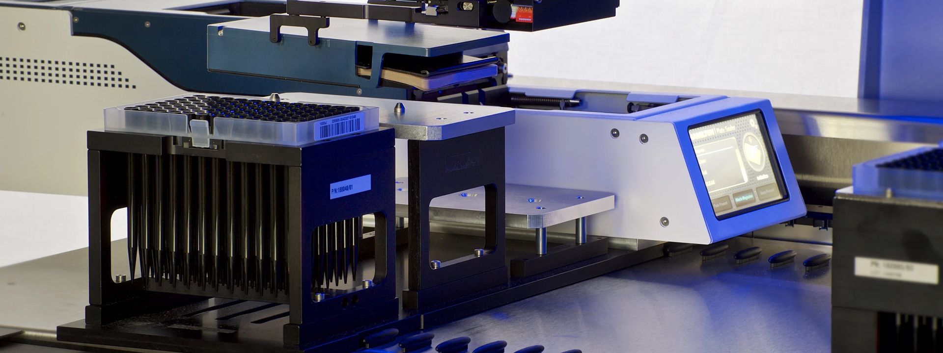 Automated laboratory plate sealer with microplate carrier, tip rack, and touchscreen control panel