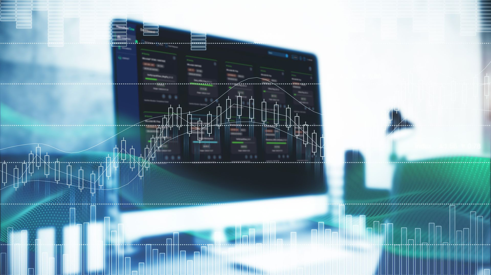 Computer monitor displaying a dark dashboard UI overlaid with candlestick charts and data visualization graphics