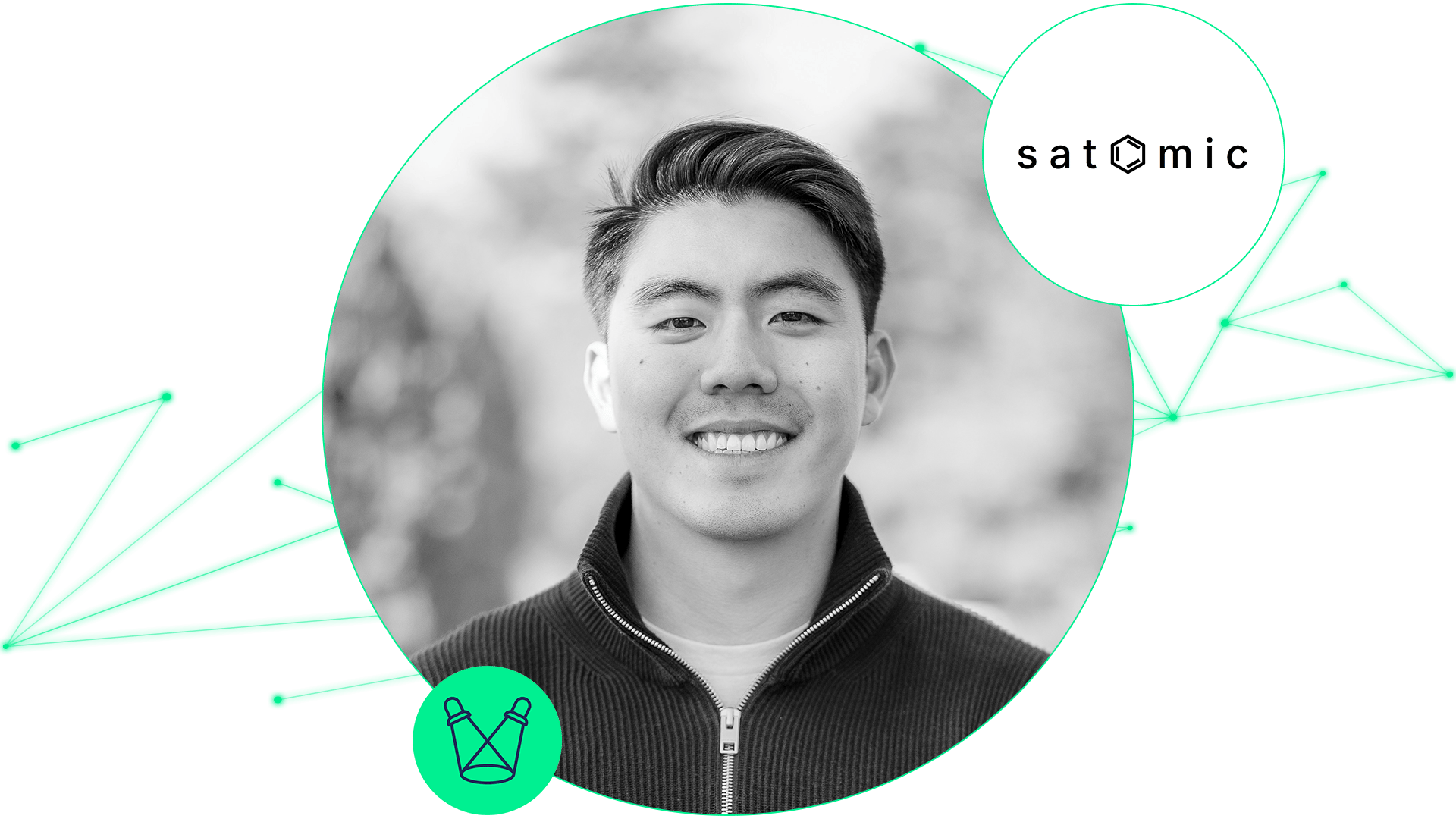 Smiling person in a black zip-up jacket, circular portrait, with Satomic logo nearby