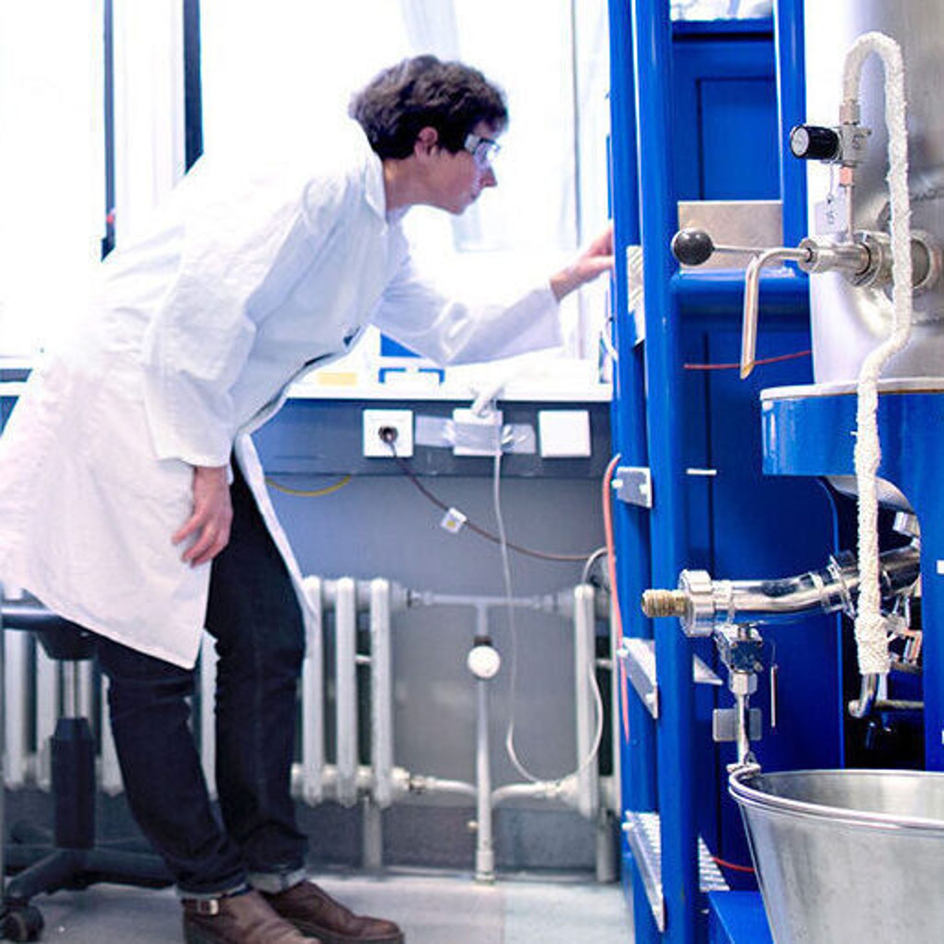Scientints working with bioreactor