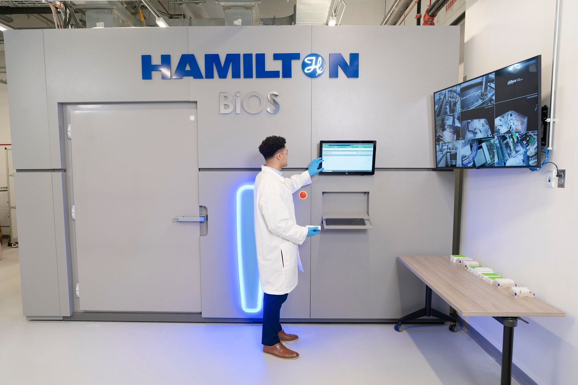 Lab Technician Interacting with Hamilton BiOS INSTINCT S Automation Software