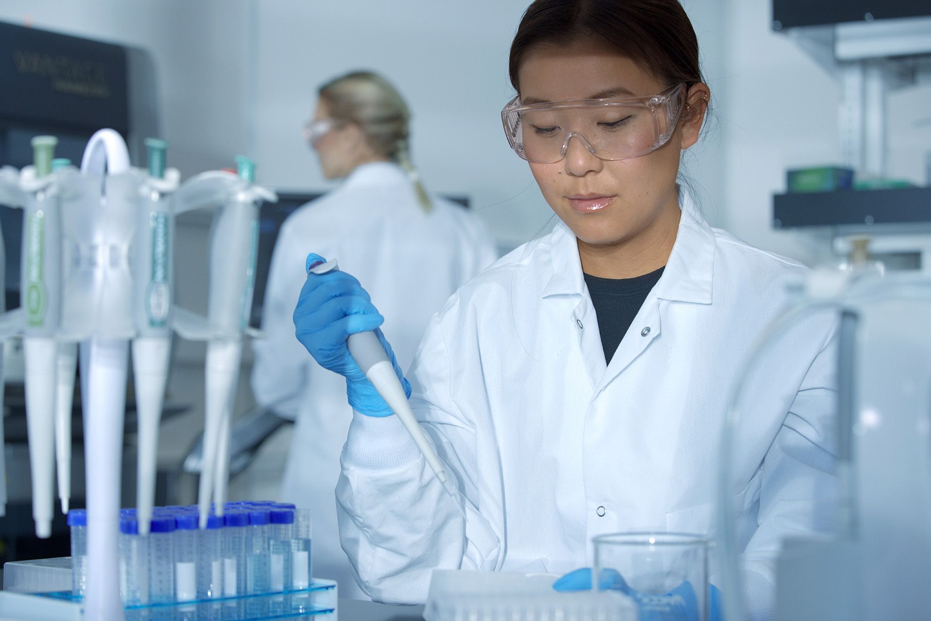 Scientist pipetting