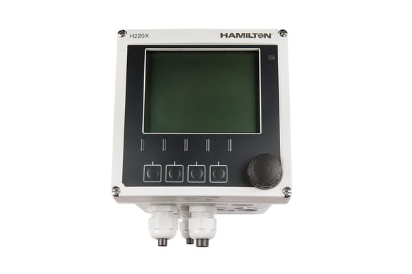 Hamilton H220X process transmitter with LCD display, four function buttons, rotary knob, and cable glands