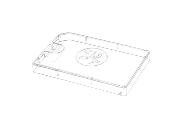 Clear acrylic rectangular tray with raised border, monogram emblem, and card holder slot