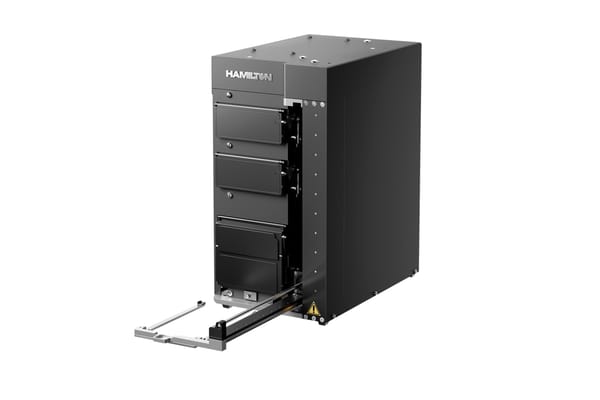 Hamilton-branded automated sample storage module with four drawer-style compartments and an extended loading tray at base