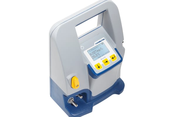 Hamilton Beverly portable dissolved oxygen meter displaying 8.027 mg/L and 25.3°C on LCD screen
