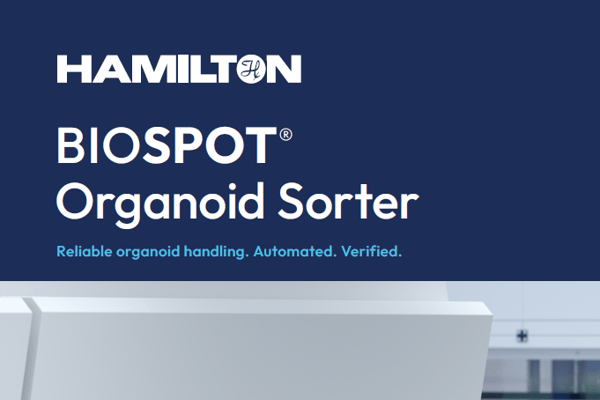 Hamilton BIOSPOT Organoid Sorter automated instrument inside a biosafety cabinet with monitor displaying sorting interface