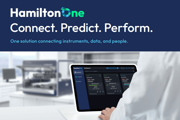 HamiltonOne dashboard UI on a tablet held by a lab professional in a white coat, with an automated liquid handler blurred in the background