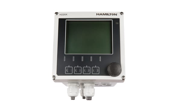 Hamilton H220X process transmitter with LCD display, four function buttons, rotary knob, and cable glands