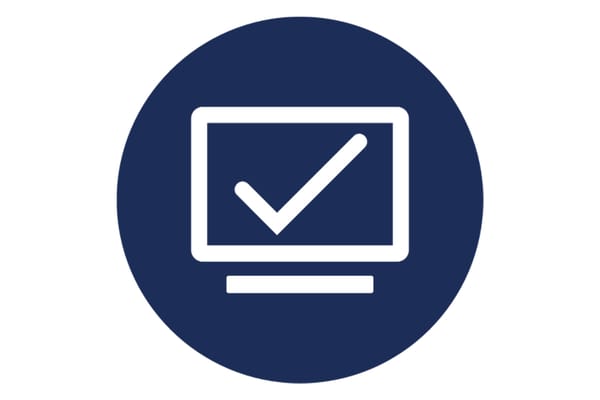 Dark navy circle icon featuring a computer monitor outline with a white checkmark on screen