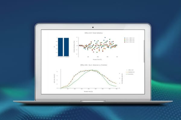 Laptop displaying bioprocess VCD model validation charts with residual plots and observed vs. predicted curves