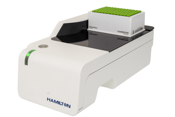 Hamilton ID Reader with a RackWare tube rack loaded with green-capped tubes on a white background