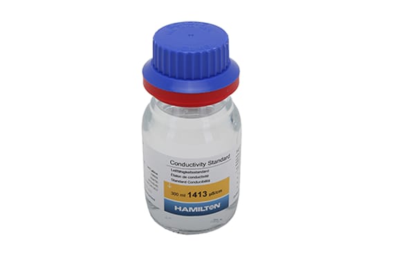 Hamilton 300 mL glass bottle of Conductivity Standard 1413 µS/cm with blue cap and red seal