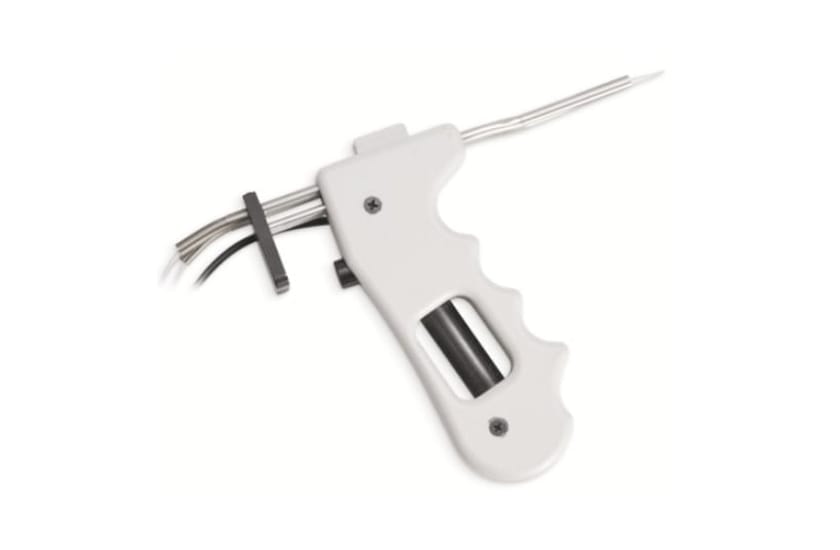White pistol-grip handle with stainless steel needle probes and attached cables