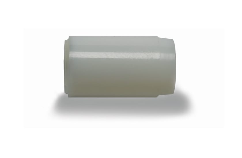 White cylindrical plastic seal spacer with slightly recessed ends, shown on white background