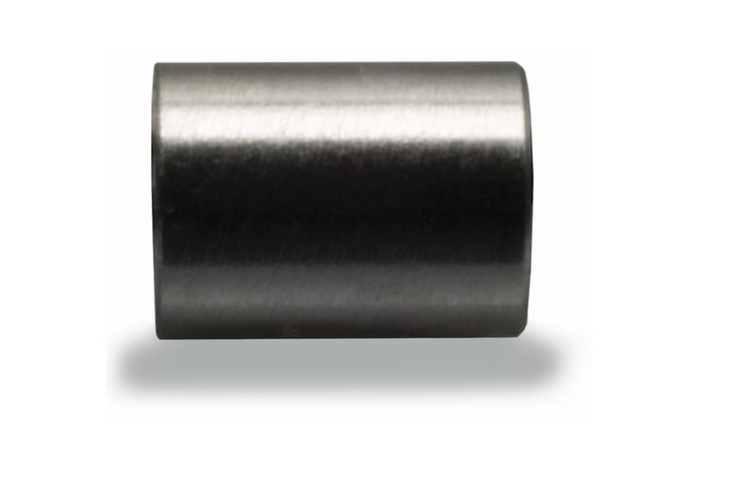 Small cylindrical metal spacer with a smooth brushed finish