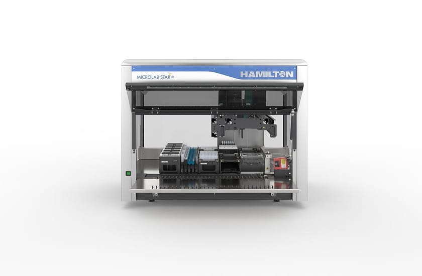 Hamilton Microlab STAR let automated liquid handling workstation with pipetting arm and deck loaded with labware