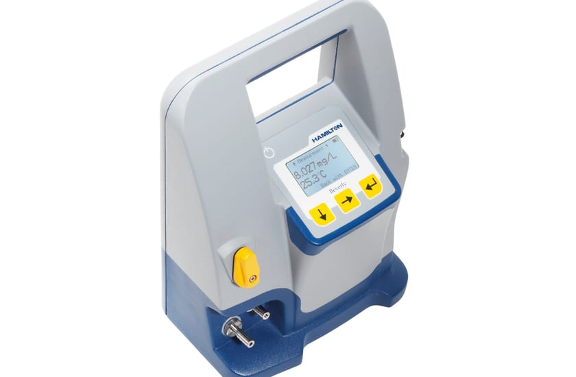 Hamilton Beverly portable dissolved oxygen meter displaying 8.027 mg/L and 25.3°C on LCD screen