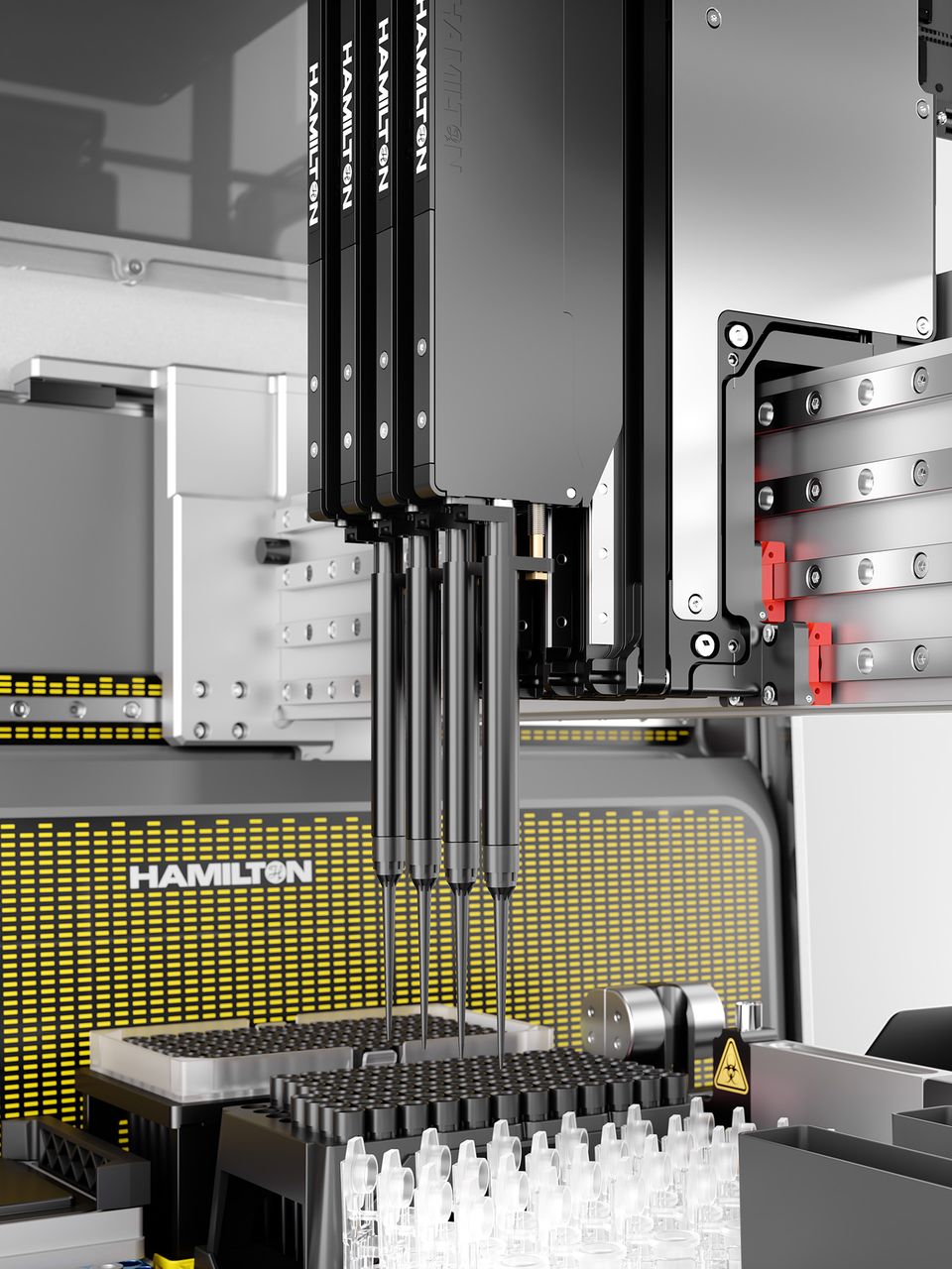 Hamilton automated liquid handler pipetting head with multiple needles positioned over sample tubes and tip rack