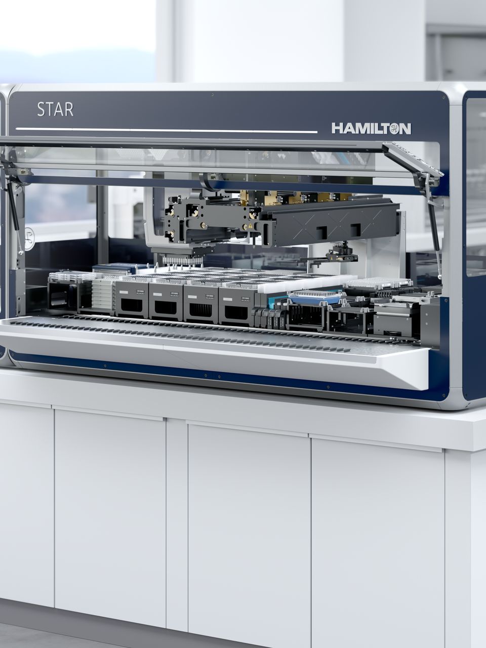 Hamilton STAR automated liquid handler with open lid, showing pipetting arm and deck with labware